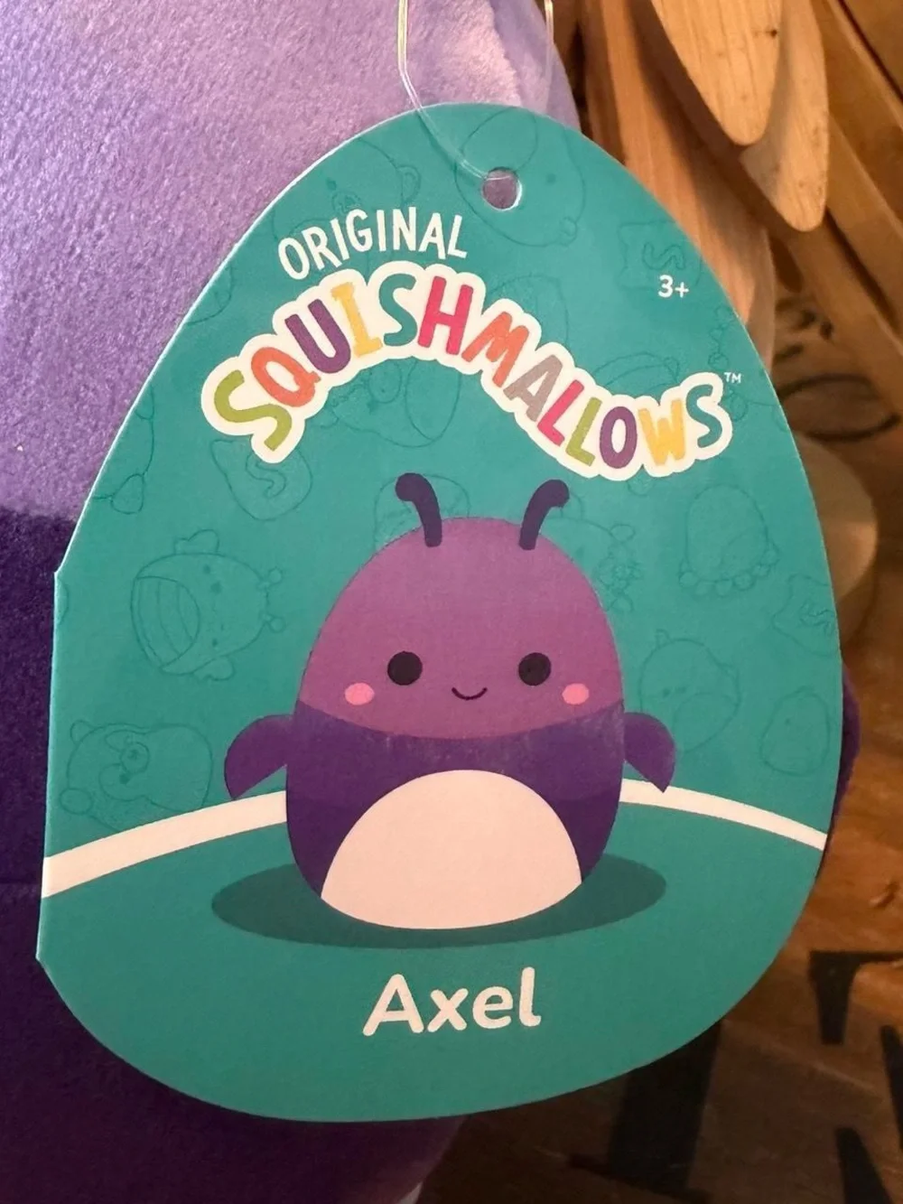 Squishmallows Purple and Cream Axel Plush Bug